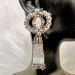 Ribbon tassel Silver earring